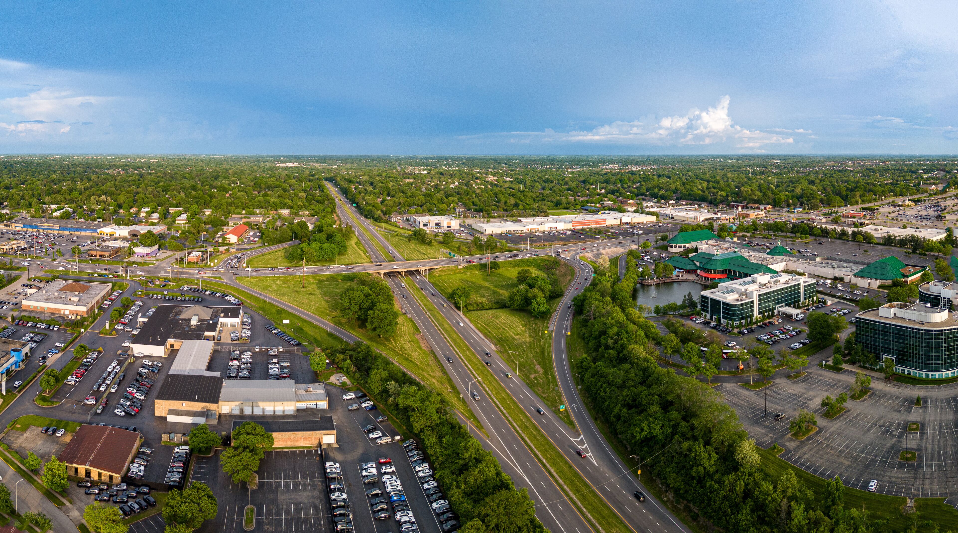 Aerial view towards suburbs of a city in central Kentucky with Lexington greens shopping plaza on Nicholasville road and New Circle road on the foreground