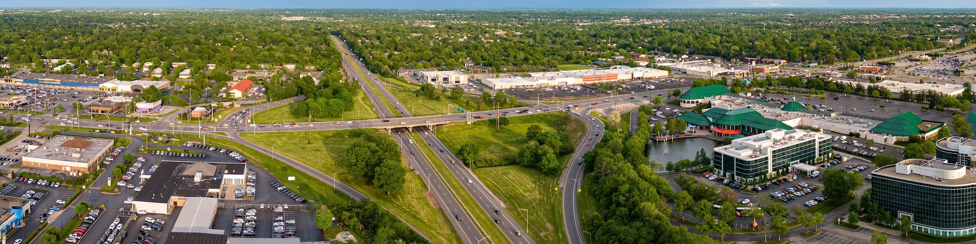 Aerial view towards suburbs of a city in central Kentucky with Lexington greens shopping plaza on Nicholasville road and New Circle road on the foreground