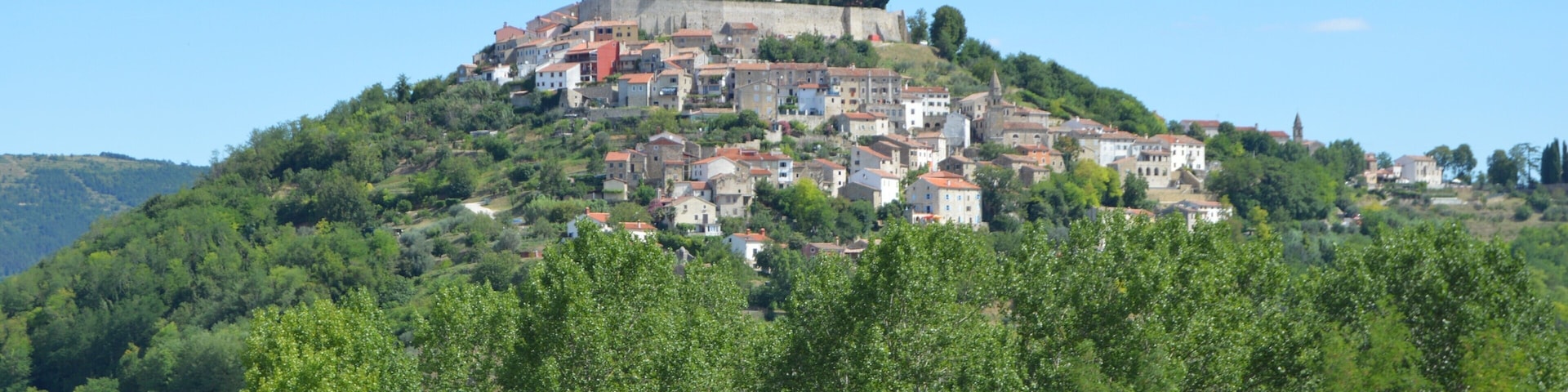 Very quite pedestrian village, which is accessible only by shuttle bus, just leave your car parked in the underneath car park, and explore this small hilly village on foot. Stumbled upon this village whilst driving towards Rovinj in Croatia.