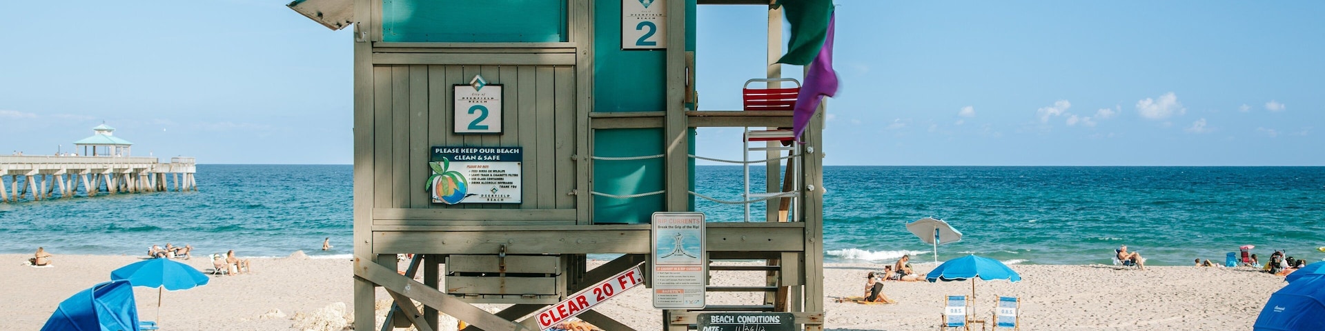 Deerfield Beach Pier which includes general coastal views and a sandy beach
