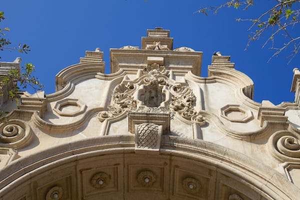 Architecture highlights the beauty of Miracle Mile in Coral Gables, Florida under clear blue skies