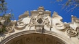 Architecture highlights the beauty of Miracle Mile in Coral Gables, Florida under clear blue skies