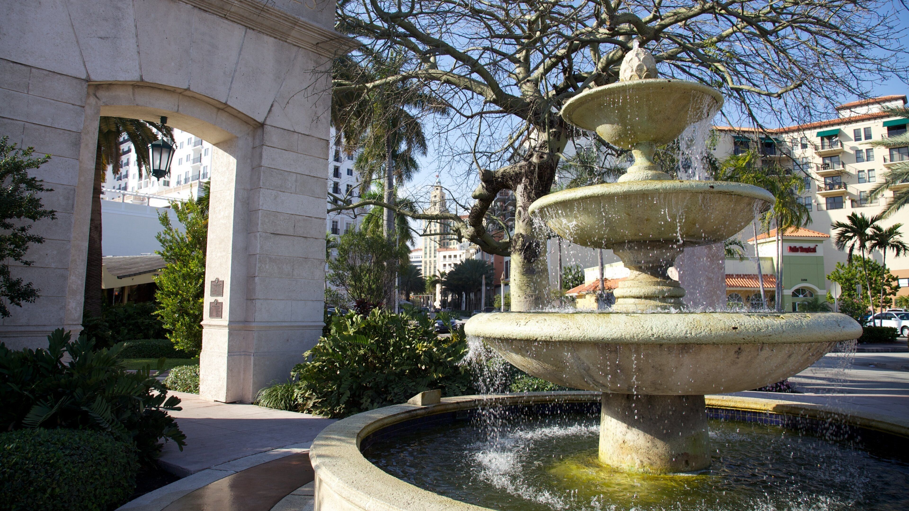 Fountain and architecture in Miracle Mile, Coral Gables, Florida on a clear day