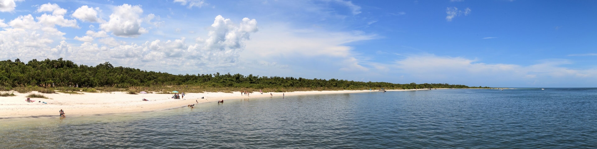 White sand beach path leading to the ocean at Lovers Key State Park Beach