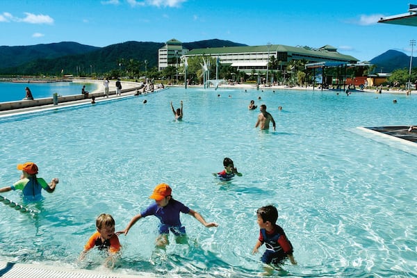 Cairns Esplanade which includes a pool, swimming and a luxury hotel or resort
