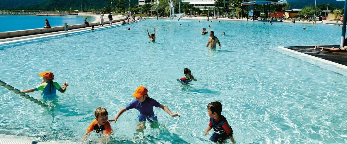 Cairns Esplanade which includes a luxury hotel or resort, a pool and swimming