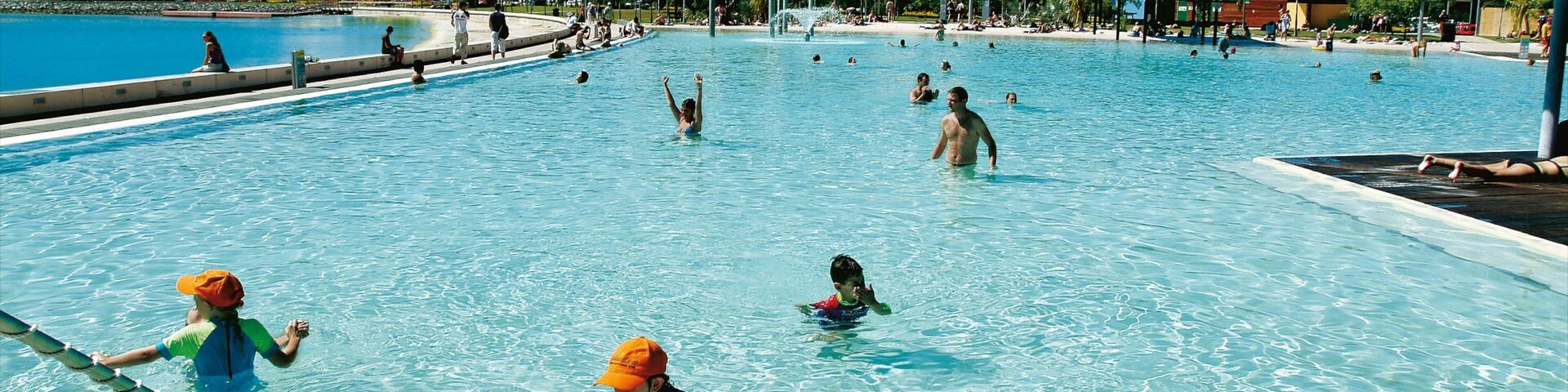Cairns Esplanade which includes a luxury hotel or resort, a pool and swimming