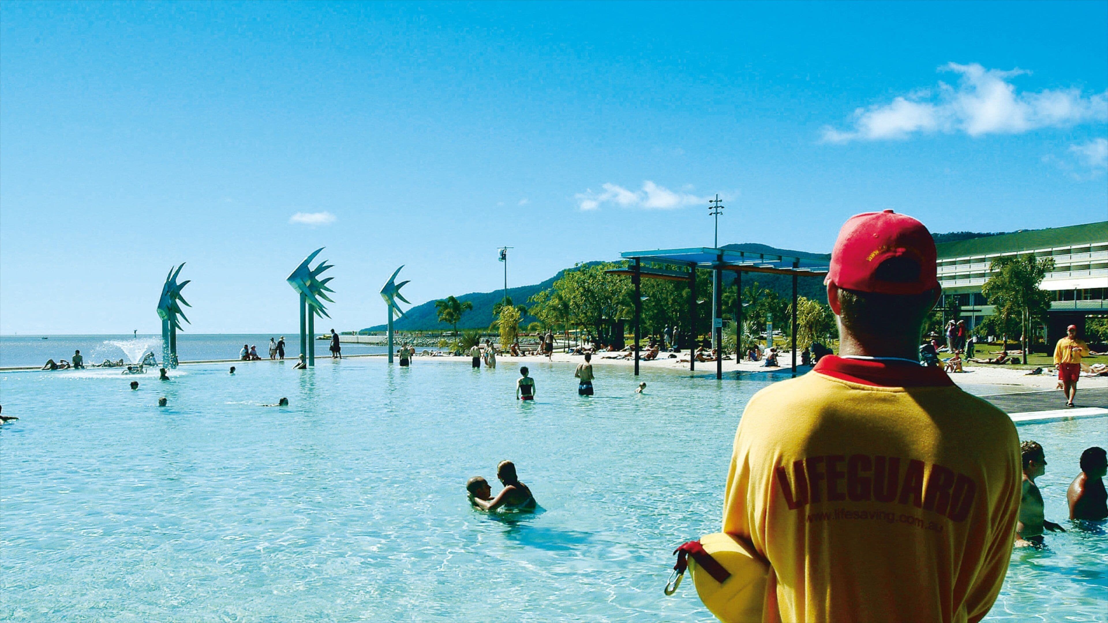 Cairns Esplanade which includes swimming and a pool as well as an individual male