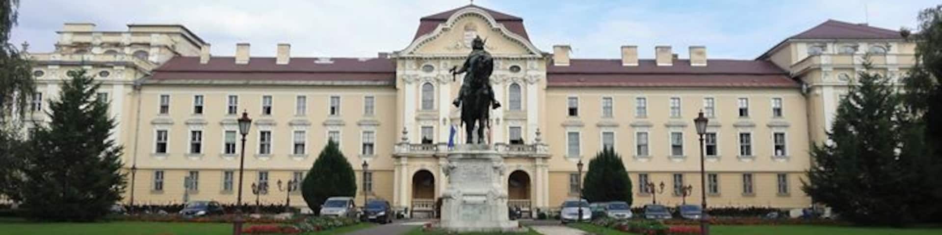 This is the main entrance to the St Stephen University of my hometown in Godollo, Hungary. The city is small and cozy and has a couple of nice attractions and landmarks such as a castle, the university, city museum and a market. Godollo is surrounded by forests and hills. They are perfect for an adventure on your bike or by car. Budapest, the capital city is only a short 30-40 minutes drive away. I love coming home here.
#Godollo #Hungary #GodolloCity