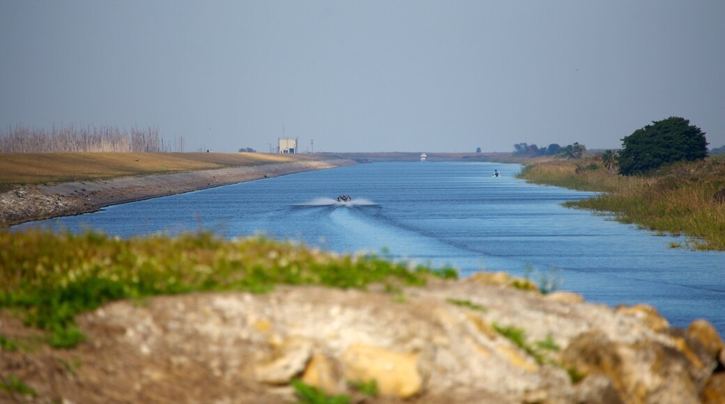 Lake Okeechobee showing a lake or waterhole and landscape views