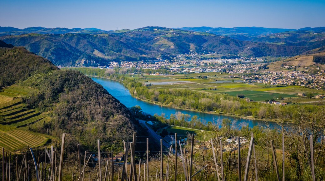 view on the Rhone river Valley, the fields, the vineyards and the Ardeche mountains from the Mejeans belvedere (Drome, France)