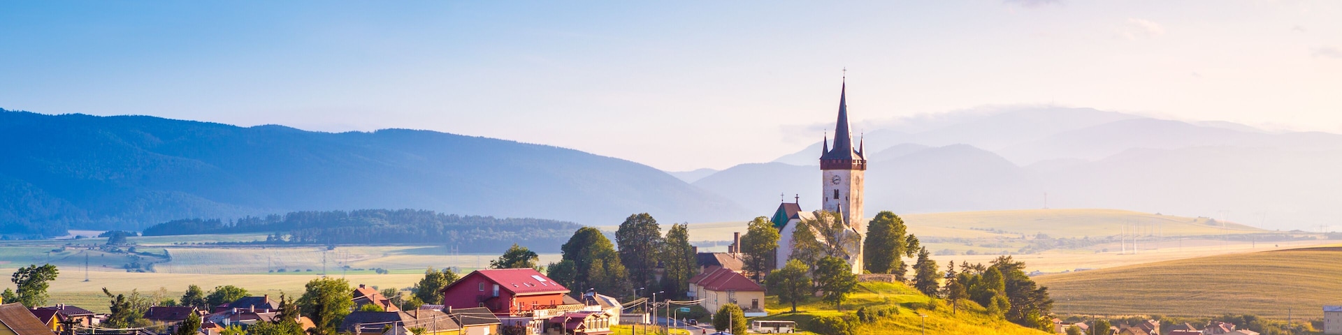 Beautiful landscape of valley in Slovakia mountains, small houses in village, rural scene. Spissky Stvrtok, Slovakia