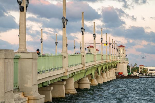 Bridge of Lions featuring a bridge, a sunset and a river or creek