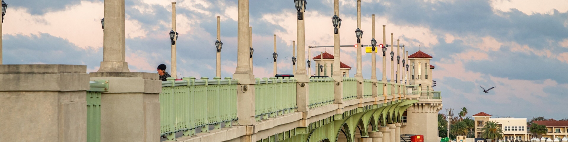 Bridge of Lions featuring a bridge, a sunset and a river or creek