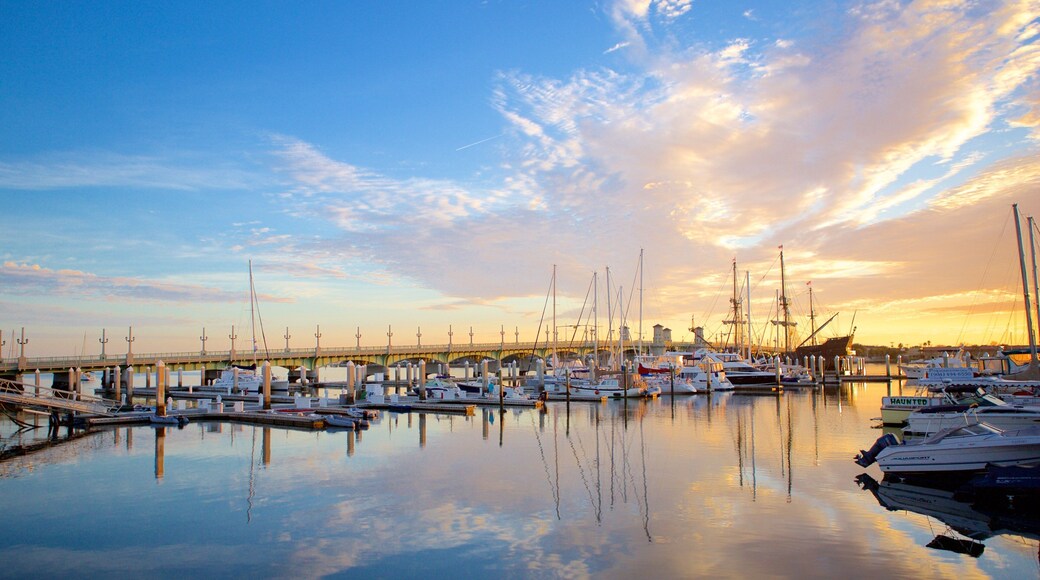 Bridge of Lions which includes a sunset, sailing and a marina