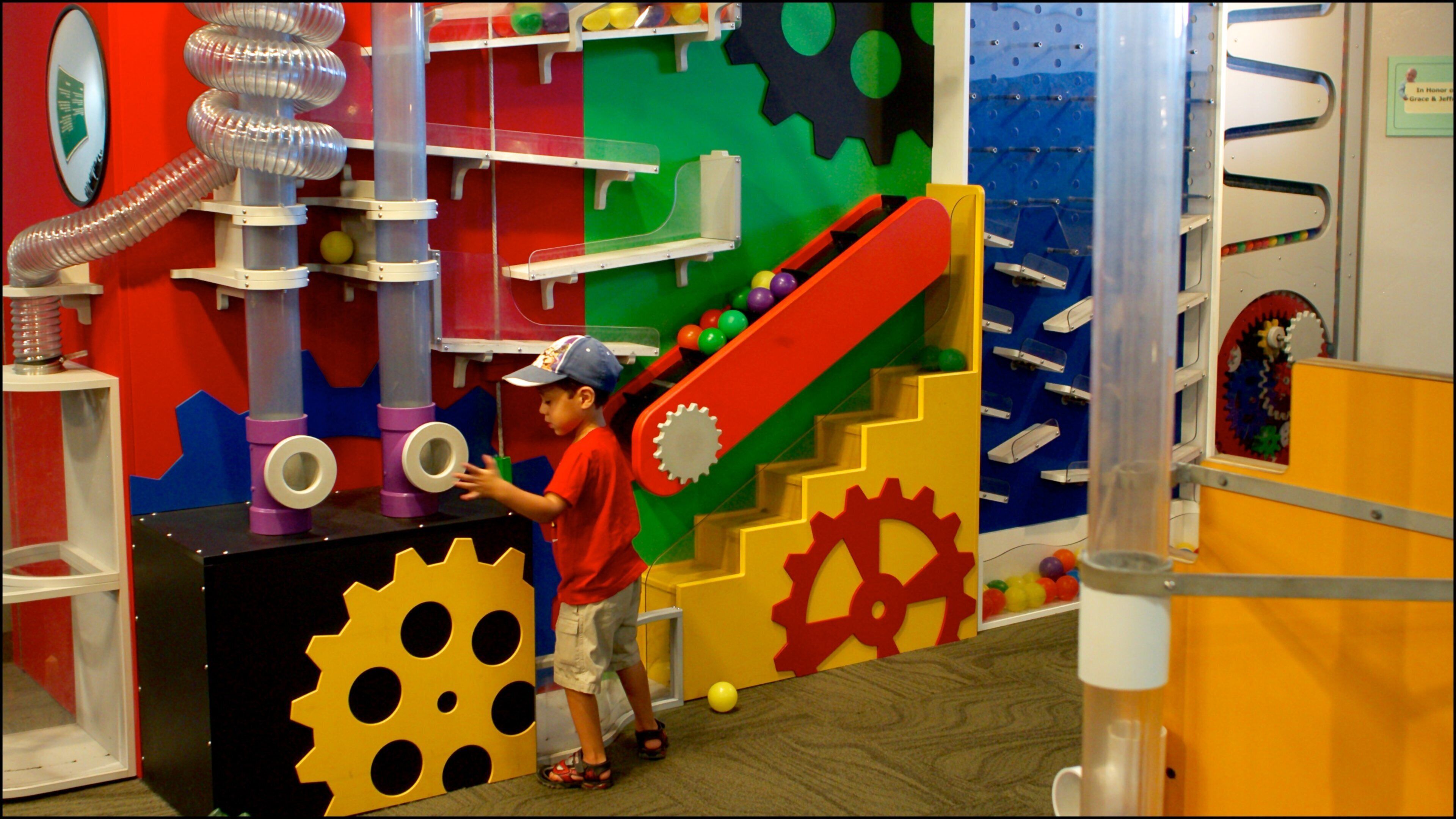 Fleet Science Center showing interior views as well as an individual child