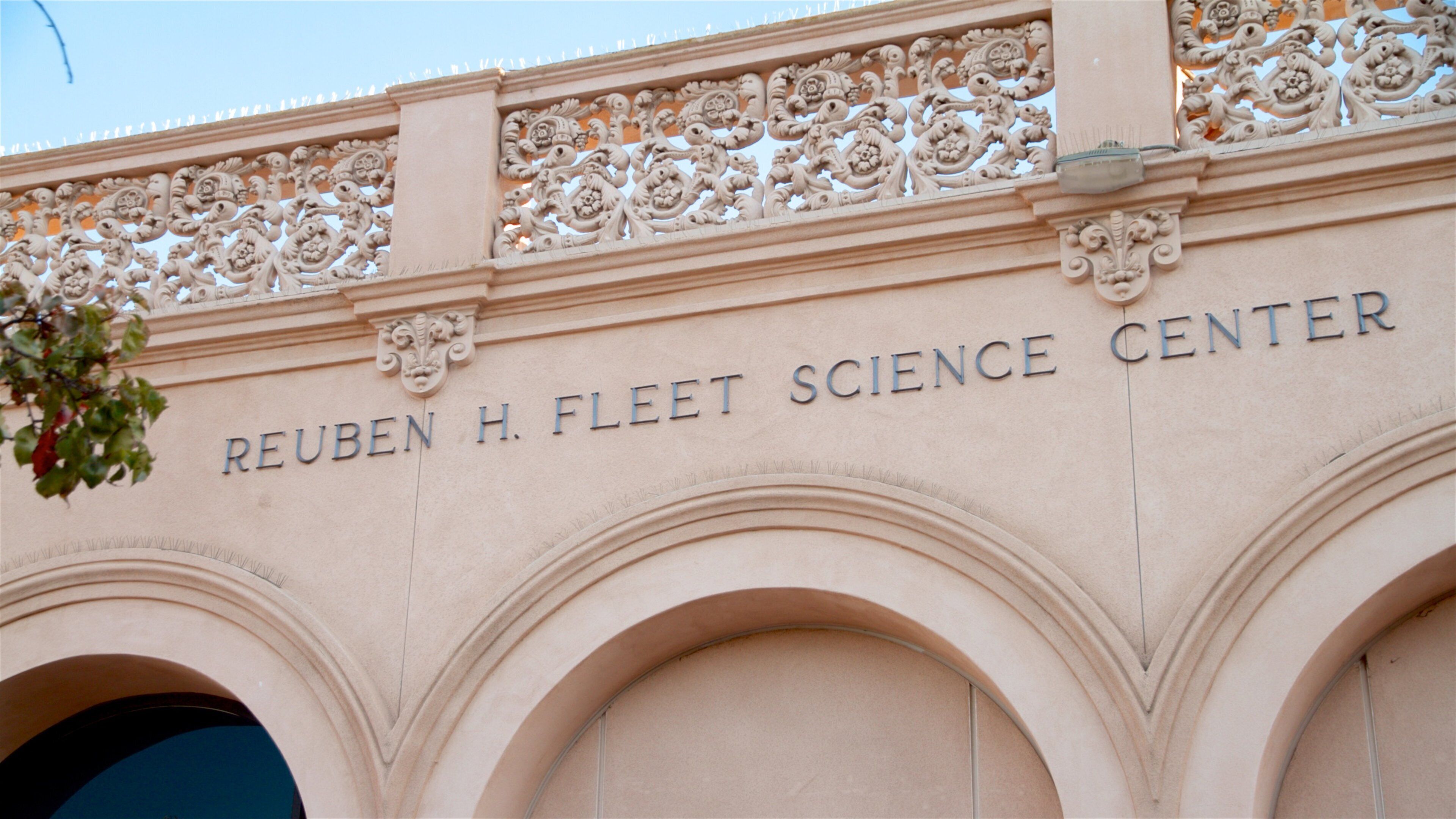 Fleet Science Center featuring signage and heritage elements