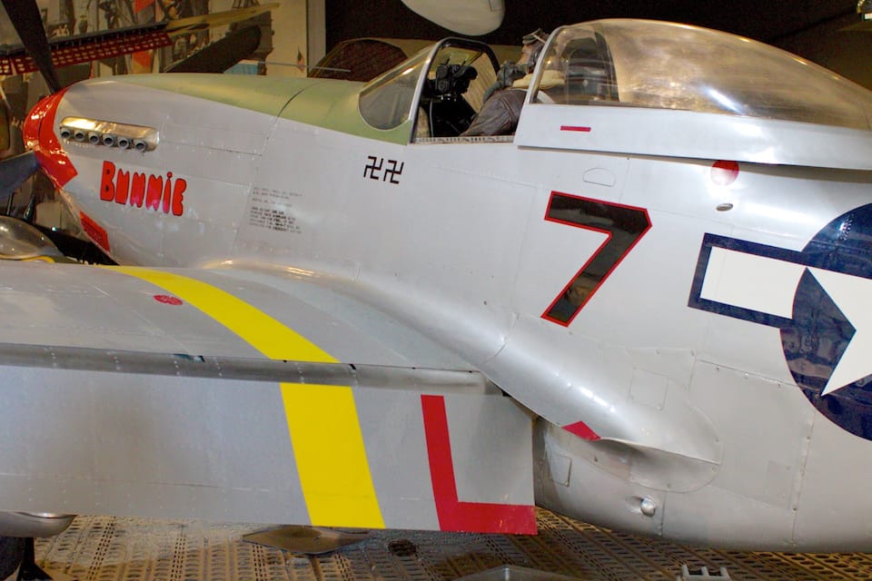 A vintage military aircraft with the number 7 and a star insignia.