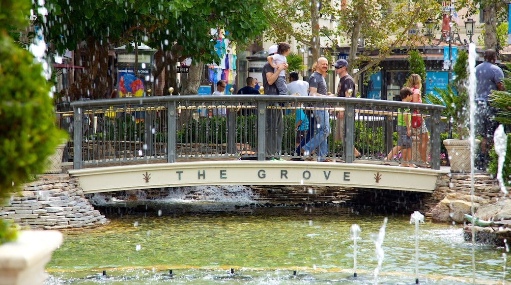 The Grove which includes a fountain, a bridge and a pond