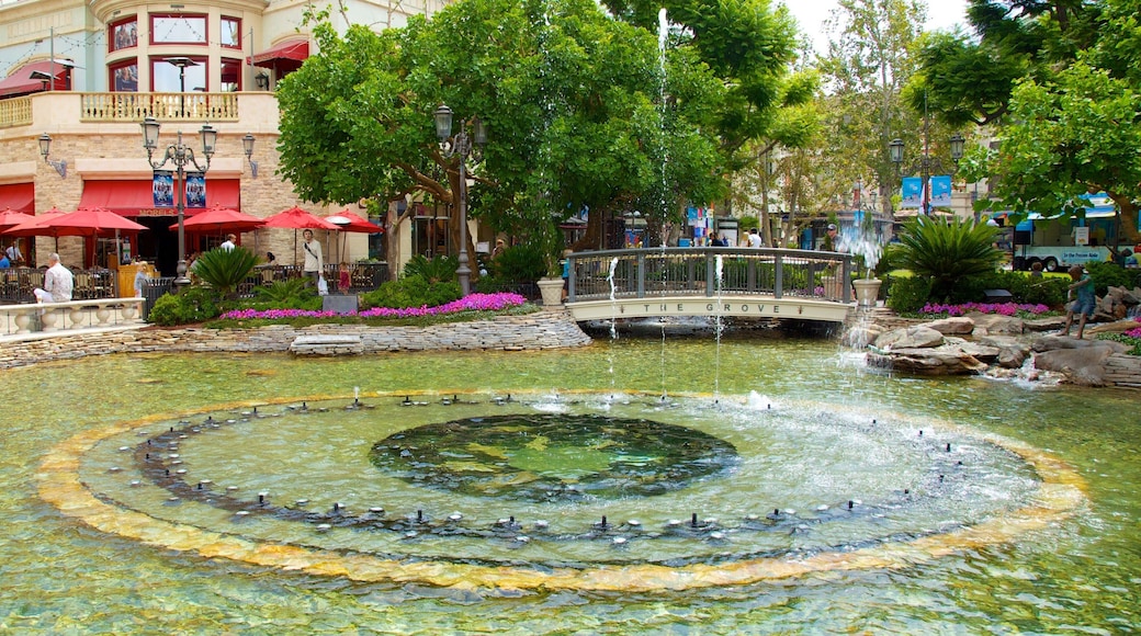 The Grove showing a park and a pond