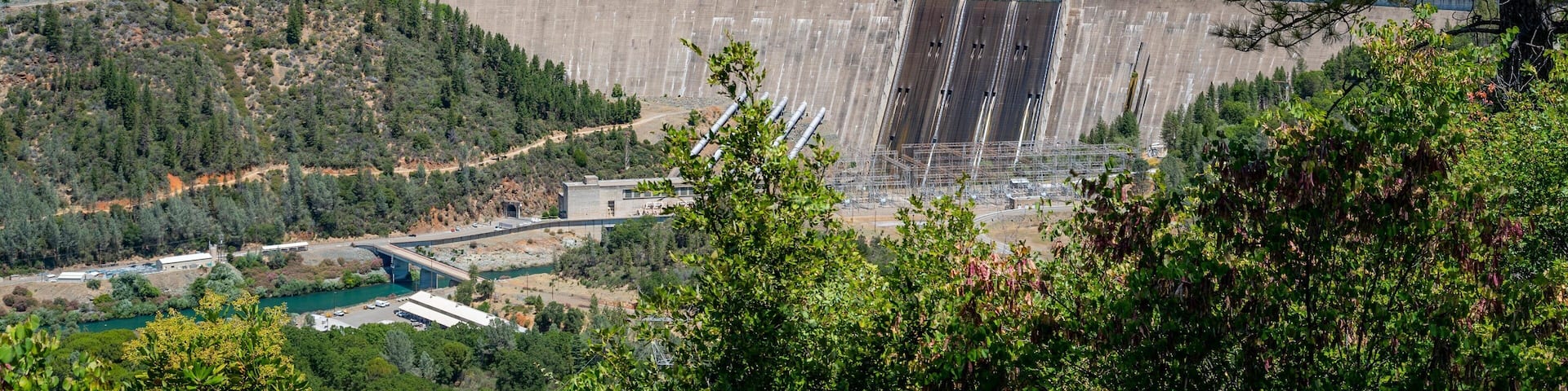 Shasta Dam featuring landscape views and a river or creek