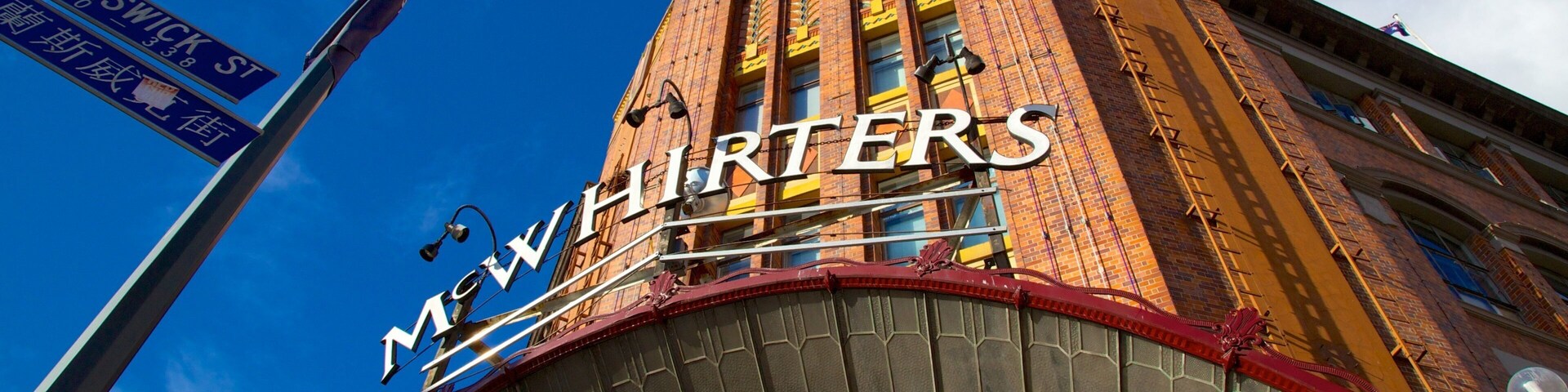 Brisbane featuring signage and a city
