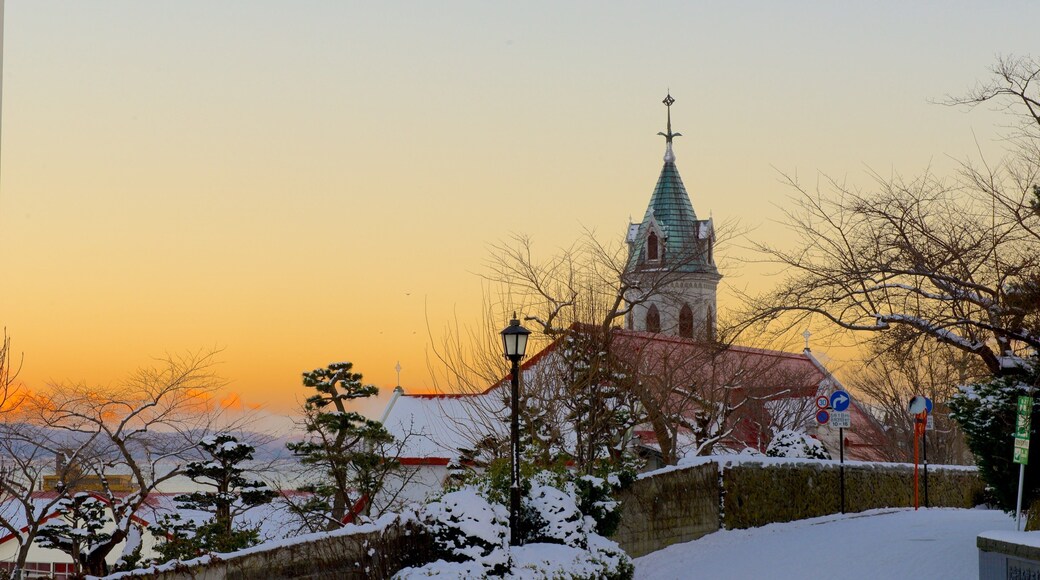 Hakodate que incluye una puesta de sol y elementos del patrimonio