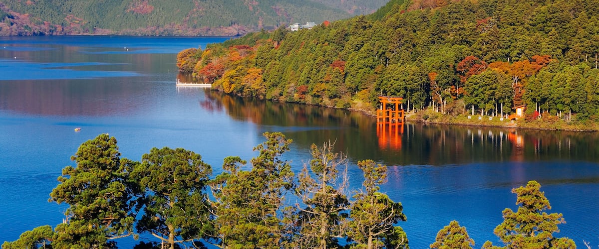 A lake with a mountain in the background.