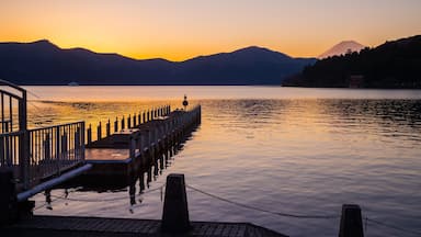 Hakone featuring a lake or waterhole and a sunset
