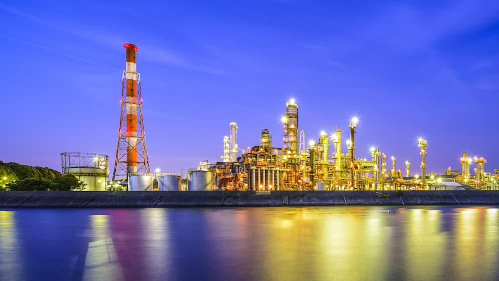 Oil refineries line a river in Yokkaichi, Japan. The city has been a center for the chemical industry since the 1930's.