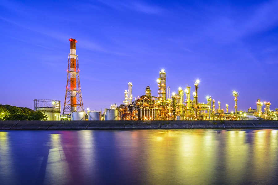 Oil refineries line a river in Yokkaichi, Japan. The city has been a center for the chemical industry since the 1930's.