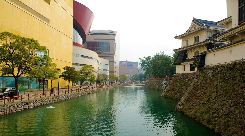 Kitakyushu which includes city views, a river or creek and a city