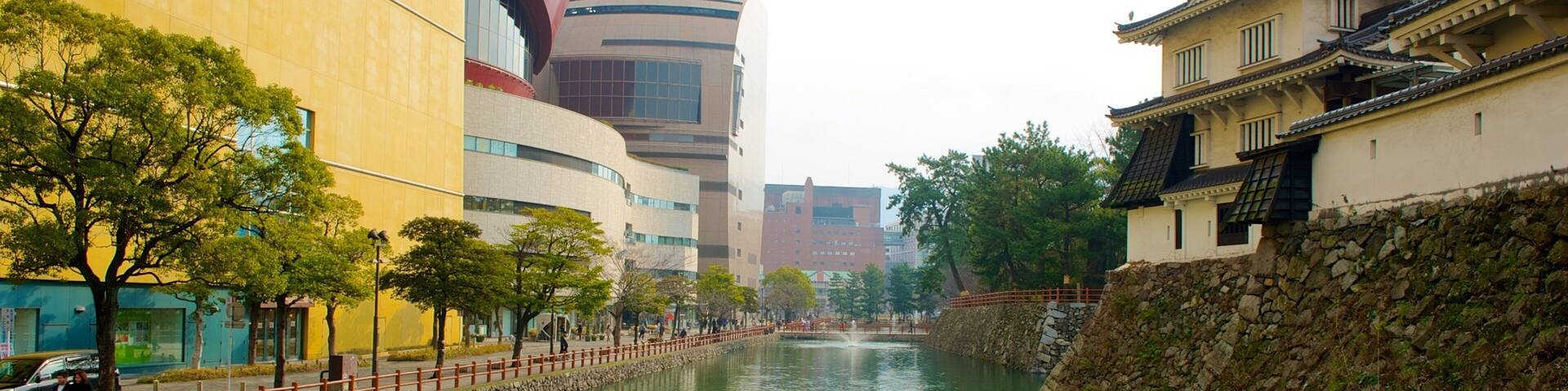 Kitakyushu which includes city views, a river or creek and a city