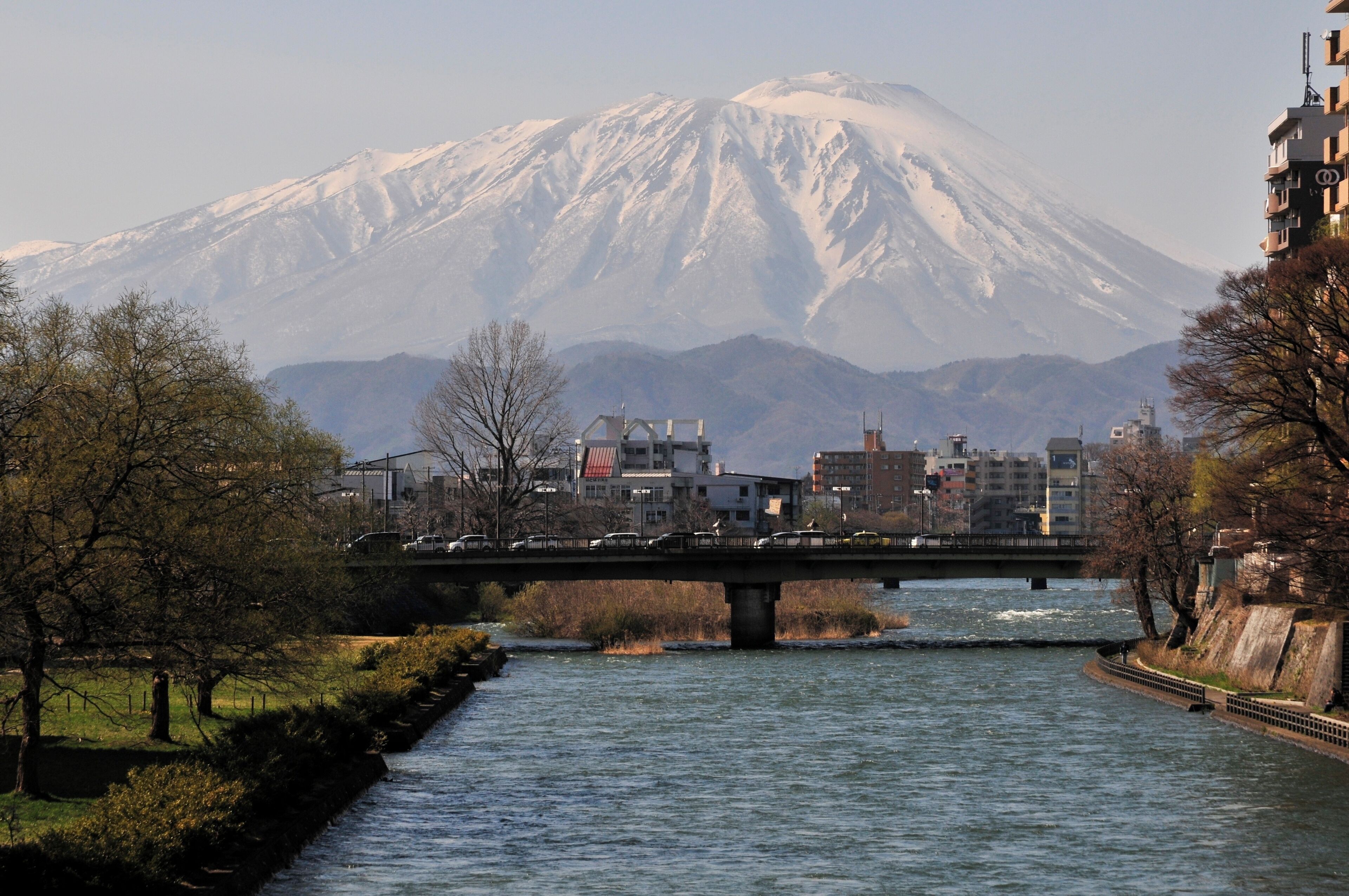 Mount Iwate and Kitakami River as seen from the Asahi bridge in Morioka, Iwate Prefecture, Japan.
