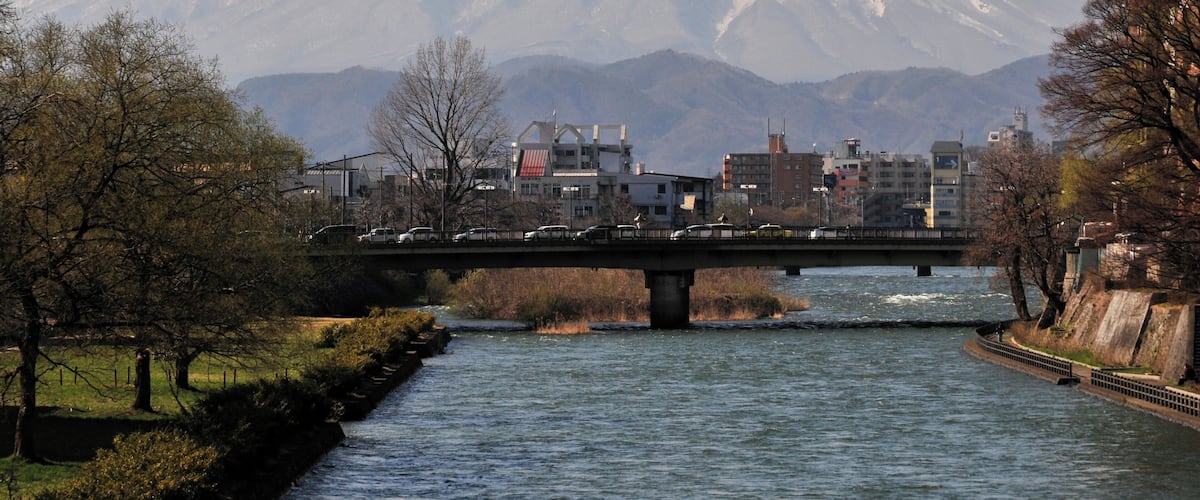 Mount Iwate and Kitakami River as seen from the Asahi bridge in Morioka, Iwate Prefecture, Japan.