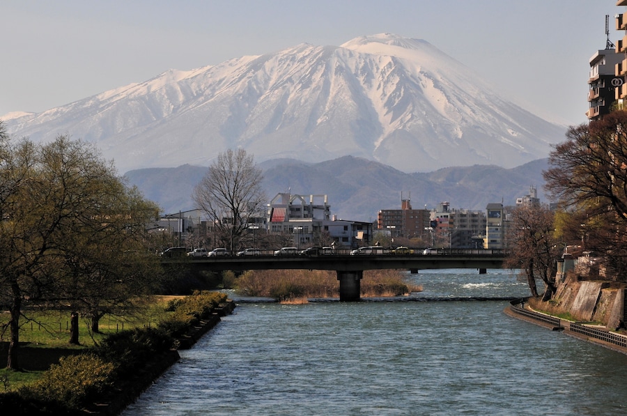Mount Iwate and Kitakami River as seen from the Asahi bridge in Morioka, Iwate Prefecture, Japan.