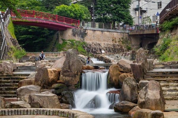 Arima Hot Springs which includes a garden and a river or creek