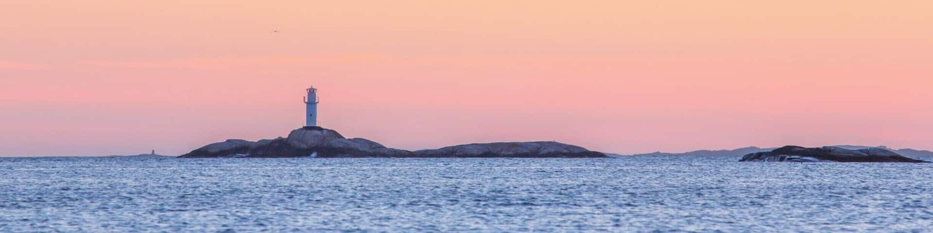 Lighthouse outside Strömstad after sunset