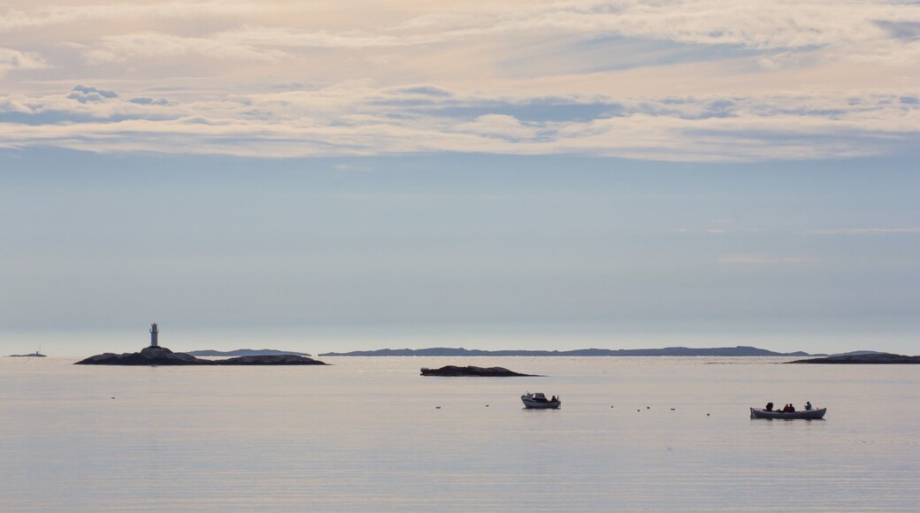 Some fishermen out on a calm evening.