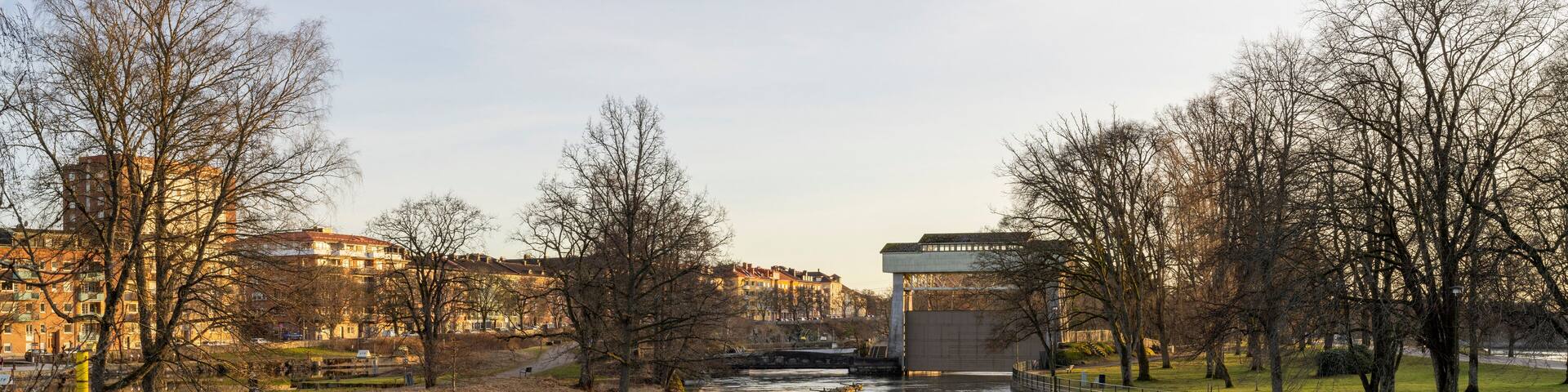 Trollhattan Midtown waterfront Old-fashioned Canal near Gota Alv river and hydroelectric Dam in Sweden during Late evening.