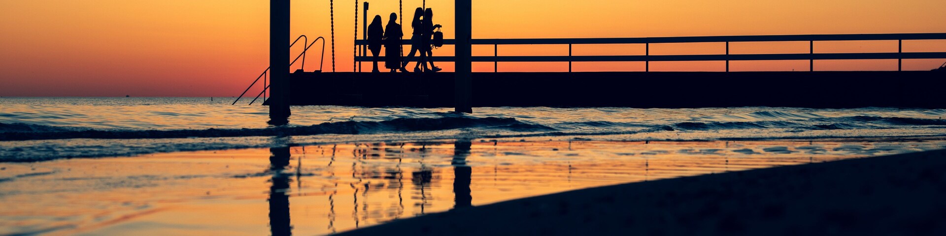 SWING IN THE SEA and sunset on the beach of Helsingborg Sweden