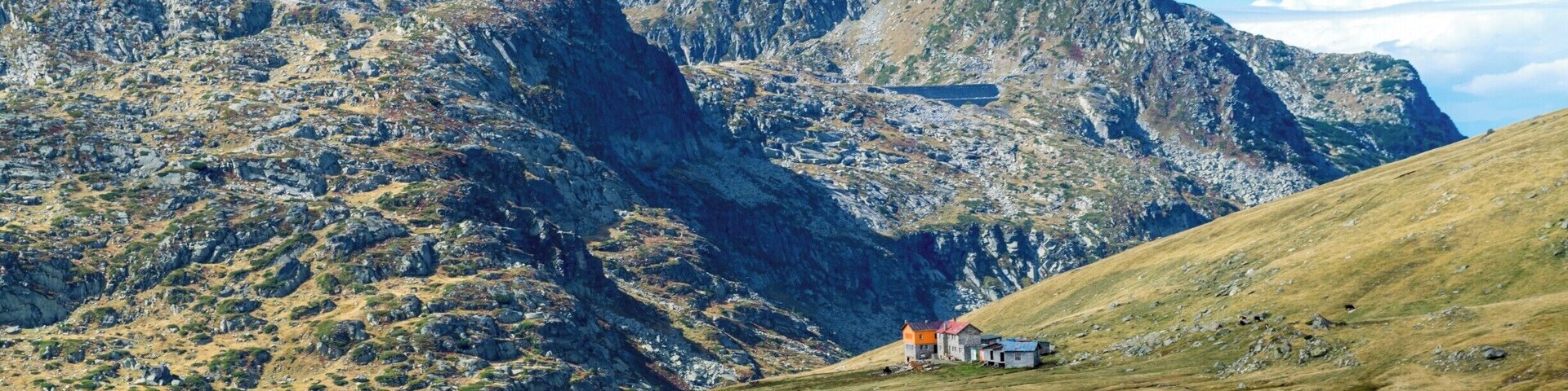 Ivan Vazov Hut (2300m above sea level) is not only one of Bulgaria’s, but also one of the Bolkan Peninsula’s highest mountain homes. It is located in the picturesque area of Pazardere in the astounding surroundings of northwest Rilla Mountain, not far from the Seven Lakes nature phenomenon.
The hut is a two storey stone building. It can accommodate 73 people. The smallest room can put up 3 and the biggest -18 tourists. Next to the hut are 6 small and 3 big cabins, each of them with either two or four beds. The hut has a kitchen and two dining rooms, one of which is self serviced – the guests can prepare their own food or make tea from herbs they have themselves picked up on the way. In summer the hut’s restaurant offers a variety of meals and fresh yogurt and cheese courtesy of the local sheep.
The hut’s water supply comes from an exquisitely clean high-mountain source. Its power is provided by its own micro power station. The young staff is responsible for the hut’s cosines and friendly atmosphere.
The hut is supplied by horses, which the guests may use to ride or transport luggage.
Source of the description: http://www.ivanvazovhut.info/
#mountain #Rila #Bulgaria #hiking