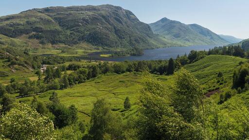A clear blue sky over the Glenfinnan monument. A rare sight in Scotland.
Makes for a good tourism shot, but maybe not a landscape award. :-)
This location is found by walking up to the Glenfinnan Viaduct view point. All signposted, then continue up the path until you see the view. Not a hard climb.