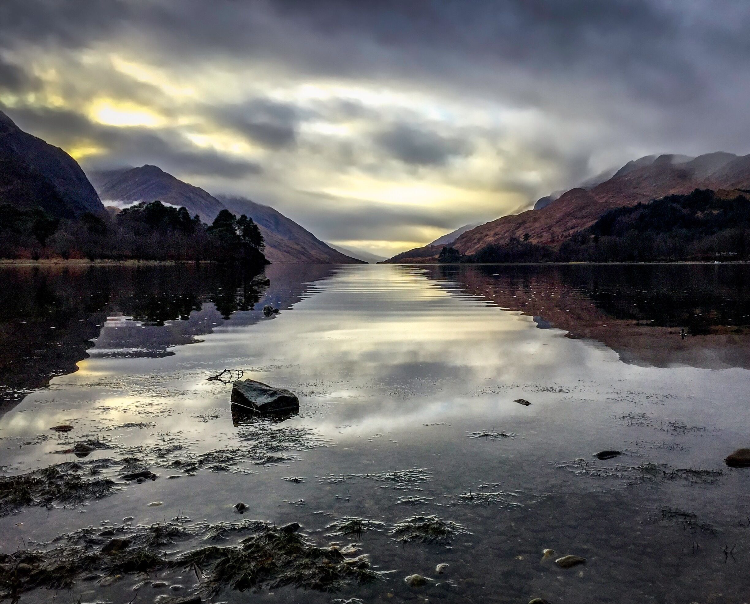 This view is a view down the Glen, catch this in the golden hour and 9 days out of 10 you will be sure to have clouds. So calm here that you can just sit and let the day go by with no worries.  A short drive from Fort William, find the monument and then just walk down to the loch edge. Setup you camera and just breathe in that fresh Scottish air. The true outdoor experience. #GreatOutdoors