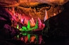 Forbidden Caverns is a charming cave in the Smokey Mountains, located not too far from Gatlinburg. The cave tour is enhanced by excellent mood lighting, which lends itself to excellent pictures.
If you plan to take pictures, be sure to bring something to stabilize your camera. Also forget about using a flash, as it washes out the color and makes the image look flat.
#colorful