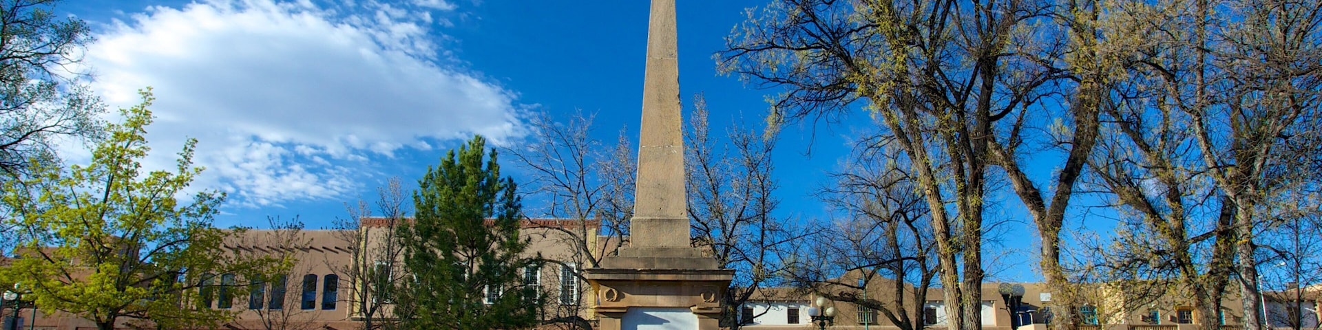 Santa Fe Plaza which includes a monument and a square or plaza