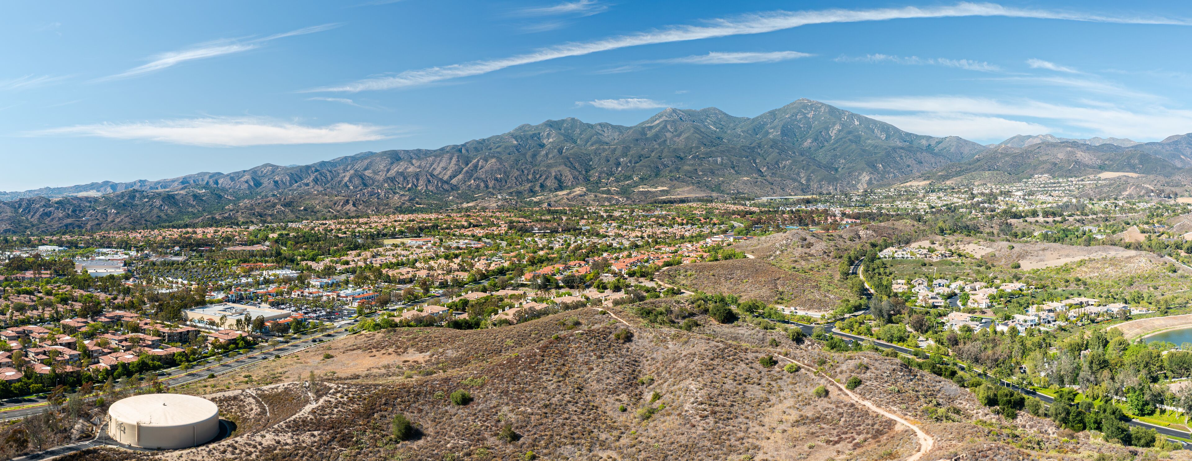 Aerial view of Rancho Santa Margarita showcasing suburban homes and Saddleback Mountains in Southern California