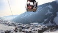 Saalbach-Hinterglemm Ski Resort featuring snow, a gondola and a small town or village