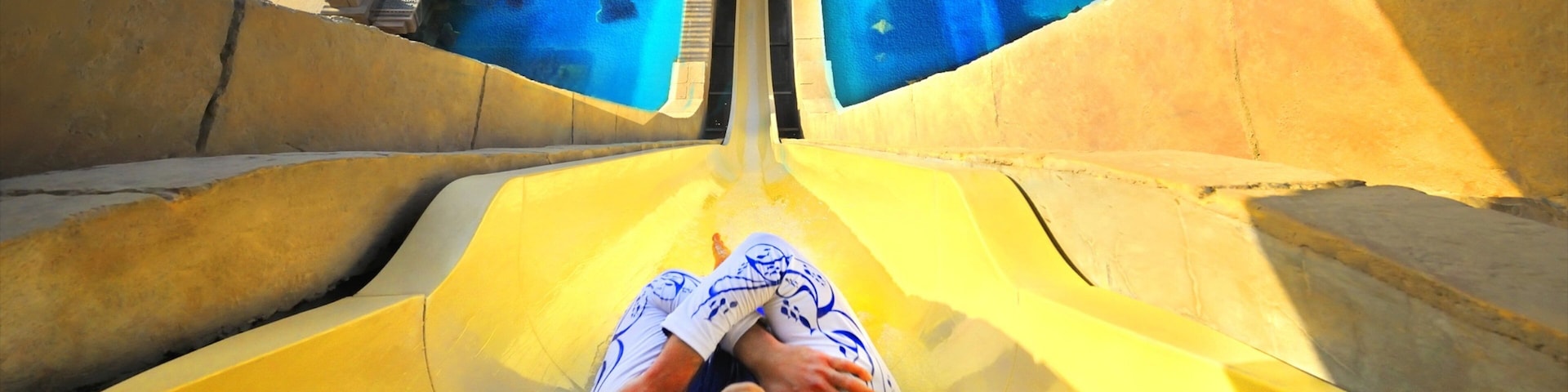 Aquaventure showing a waterpark as well as an individual femail