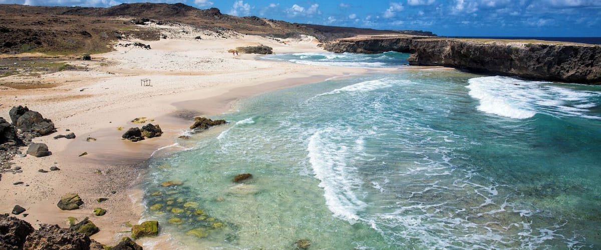 On the hike to the Natural Pool in Aruba we stumbled across this gorgeous beach. Called Boca Keto Beach, the water is a little too rough here to go swimming, but it does make a scenic spot.
To read more about how to get here and how to hike to the Natural Pool, read: http://www.earthtrekkers.com/adventure-aruba-visit-natural-pool-daimari-beach/